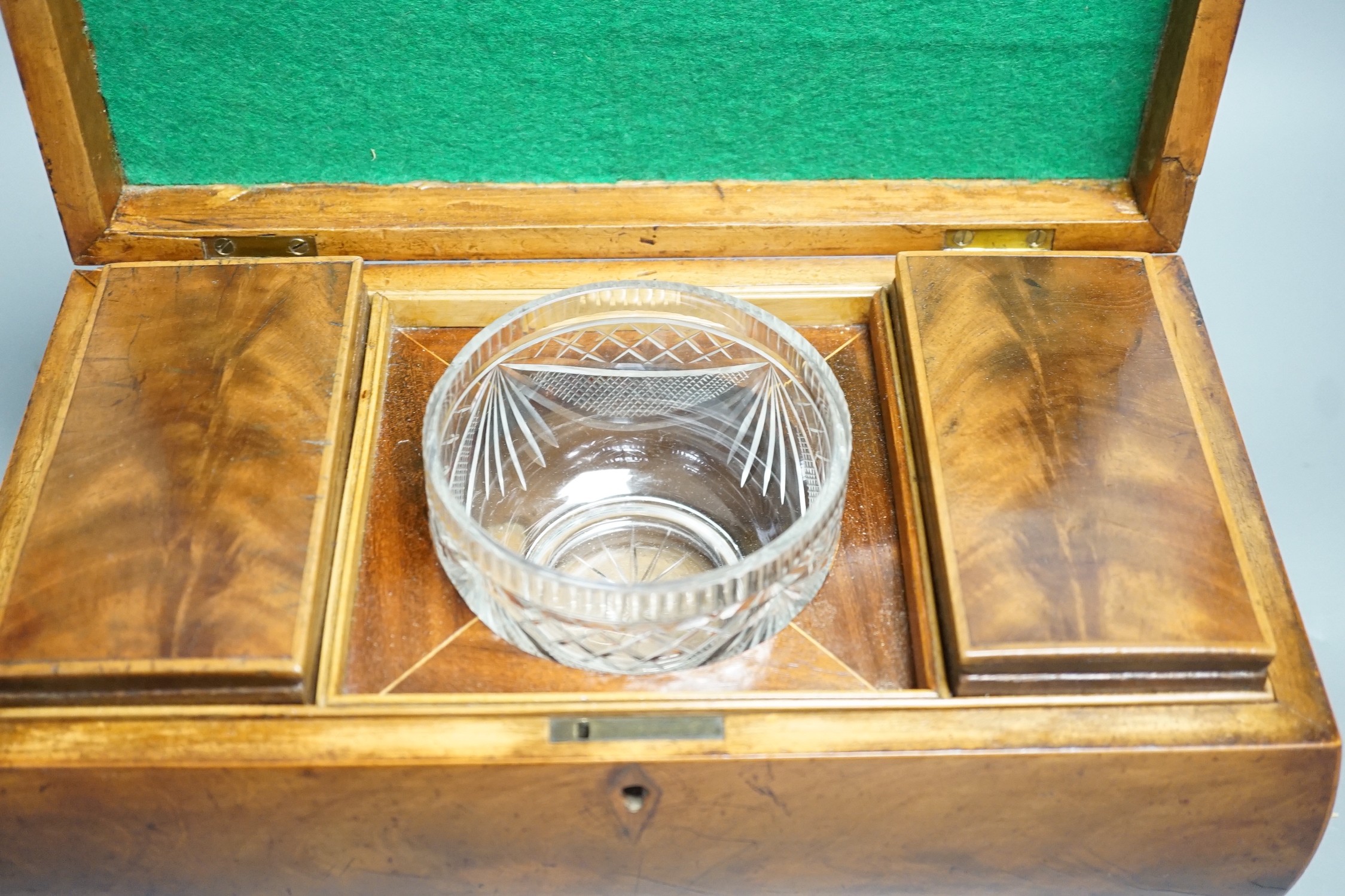 A George IV mahogany bombe-shaped sarcophagus tea caddy, 33cms wide
